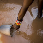 herder-collecting-water